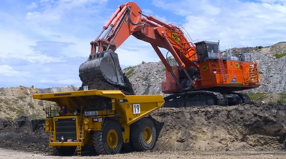 Excavator loading a quarry truck